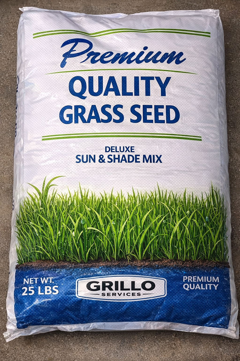 Premium Quality Grass Seed 25 lb bag by Grillo Services, Deluxe Sun & Shade Mix, shown upright on a concrete floor with white packaging, bold blue lettering, green accent lines, and a grass graphic along the bottom.