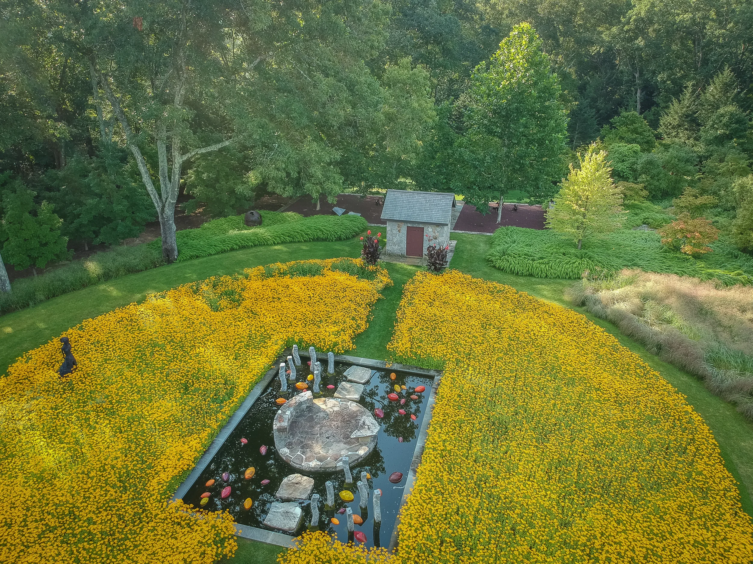 Flowering planting design and water feature at InSitu in Redding, Connecticut