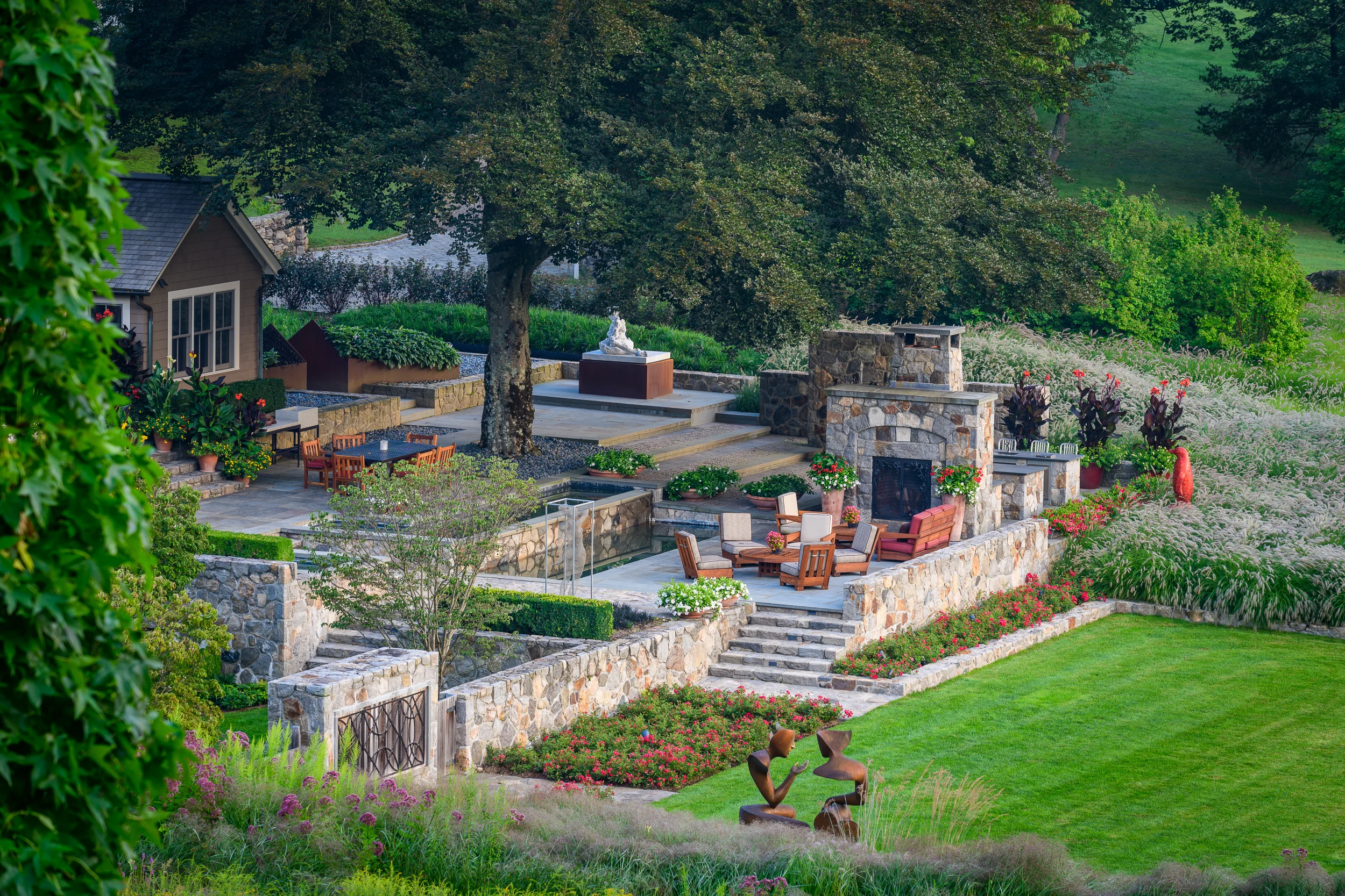 Terraces, fireplace, and lawn at InSitu in Redding, Connecticut